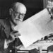 1930, Vienna, Austria --- Sigmund Freud, 1856-1939, Austrian psychiatrist, in the office of his Vienna home looking at a manuscript. --- Image by © Bettmann/CORBIS