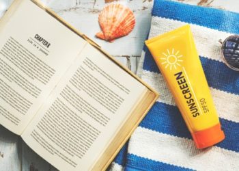 Sunscreen Sunglasses Towel Book Recess Relax Concept